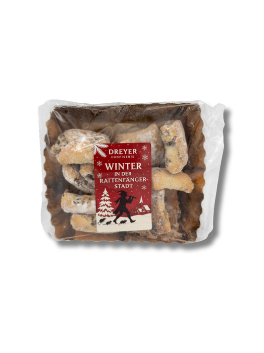 Verpackung von Stollenkonfekt Bratapfel 350 g – feines Stollengebäck mit saftiger Apfel-Zimt-Füllung, erhältlich in der Dreyer Confiserie in der Rattenfängerstadt Hameln.