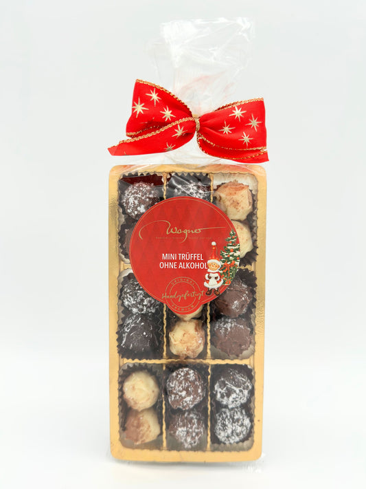 Wagner Mini-Trüffelpralinenmischung ohne Alkohol 100 g, handgefertigte alkoholfreie Pralinen mit winterlichen Sorten wie Lebkuchen, Spekulatius und Zimt-Vanille, erhältlich in der Dreyer Confiserie in der Rattenfängerstadt Hameln.