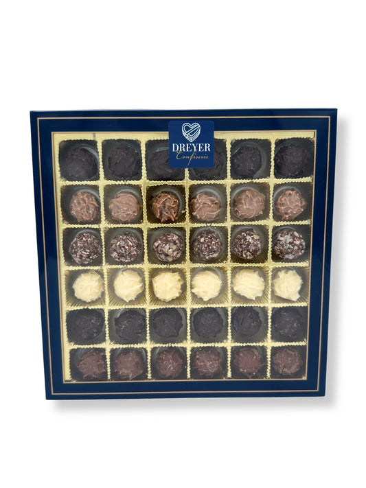 Wagner Mini Trüffelvariation ohne Alkohol 200 g, erlesene Auswahl handgefertigter alkoholfreier Mini-Trüffel in Edelbitter-, Vollmilch- und weißer Schokolade, erhältlich in der Dreyer Confiserie in der Rattenfängerstadt Hameln.
