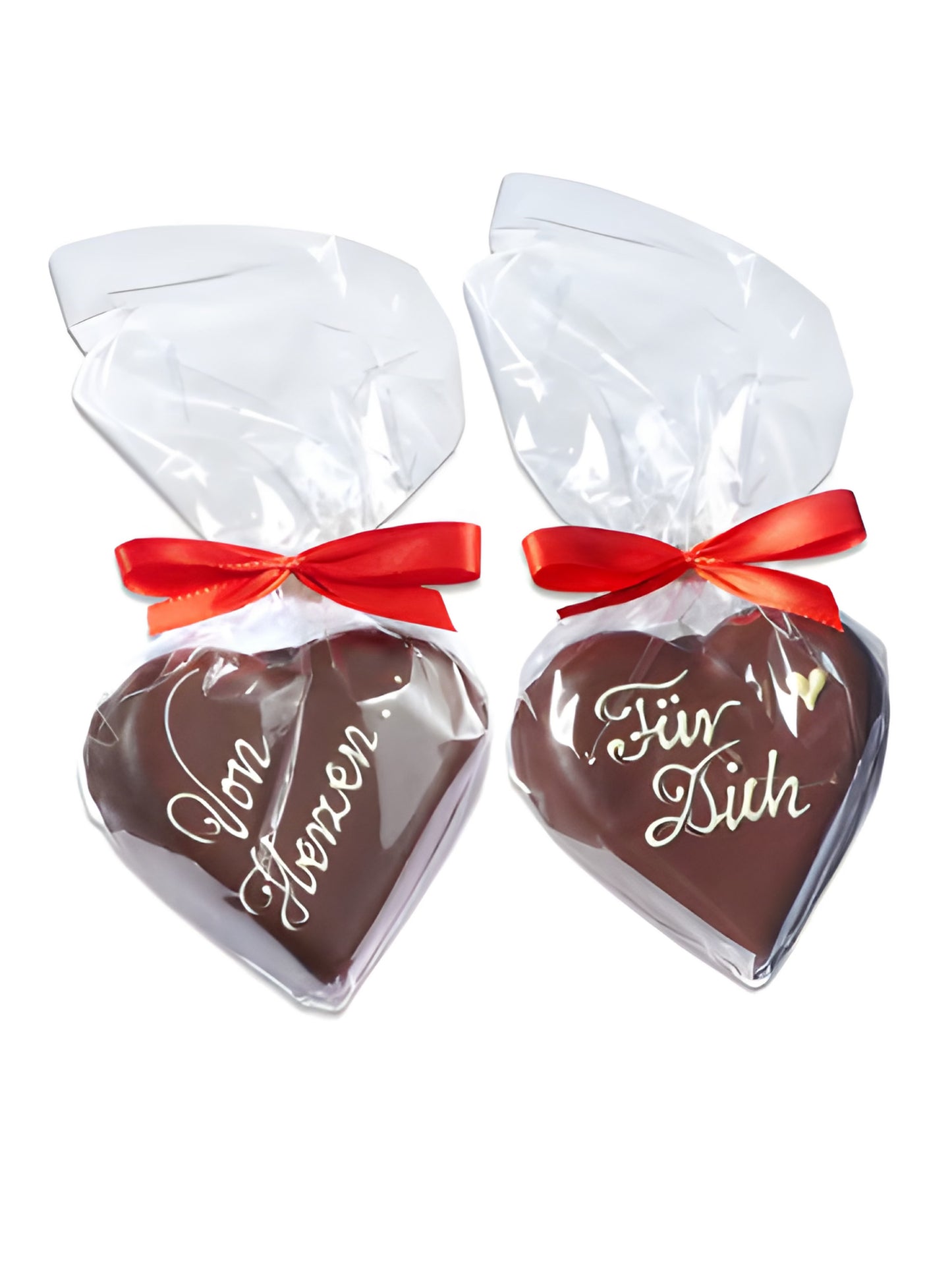 Wagner Pralinen Edelmarzipanherz 120g in Zartbitterschokolade, dekoriert mit weißer Schokolade, herzförmige Geschenkverpackung. Erhältlich in der Dreyer Confiserie aus der Rattenfängerstadt Hameln. 