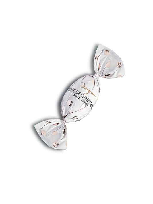 Trüffel-Osterei Marc de Champagne von Wagner, edle Vollmilchschokolade mit feiner Champagner-Trüffelfüllung, erhältlich in der Confiserie Dreyer.