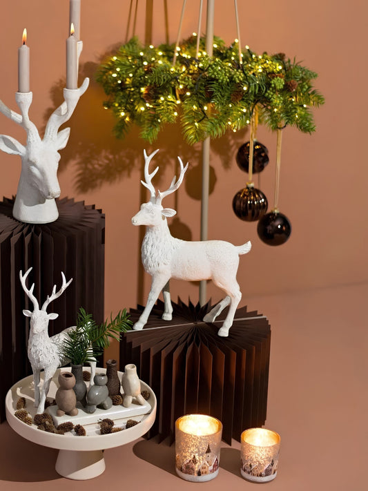 Windlicht Häuser Motiv aus Glas von G. Wurm in weihnachtlicher Dekoration mit Tannengrün