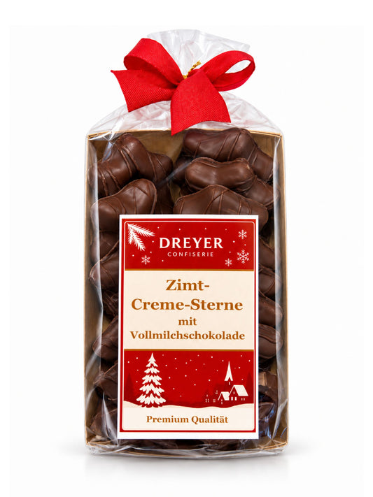Zimt-Creme-Sterne mit Vollmilchschokolade 150g von Dreyer Confiserie in weihnachtlicher Verpackung